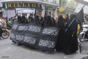 A pro-Sharia march in 2013. Campaigning for strict implementation of Sharia is a common activity among online disseminators